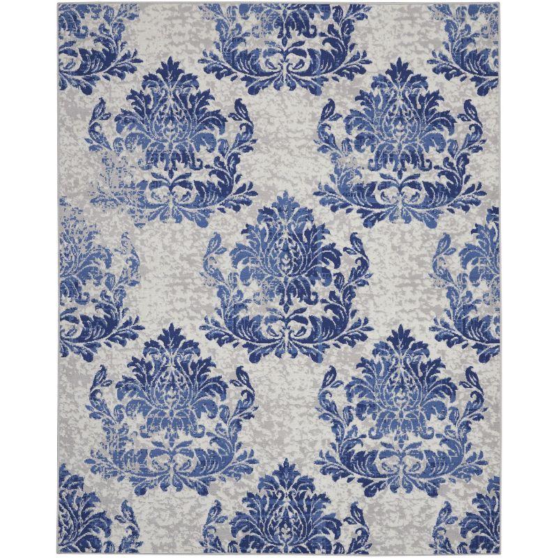 Ivory Floral Synthetic 8' x 10' Reversible Area Rug