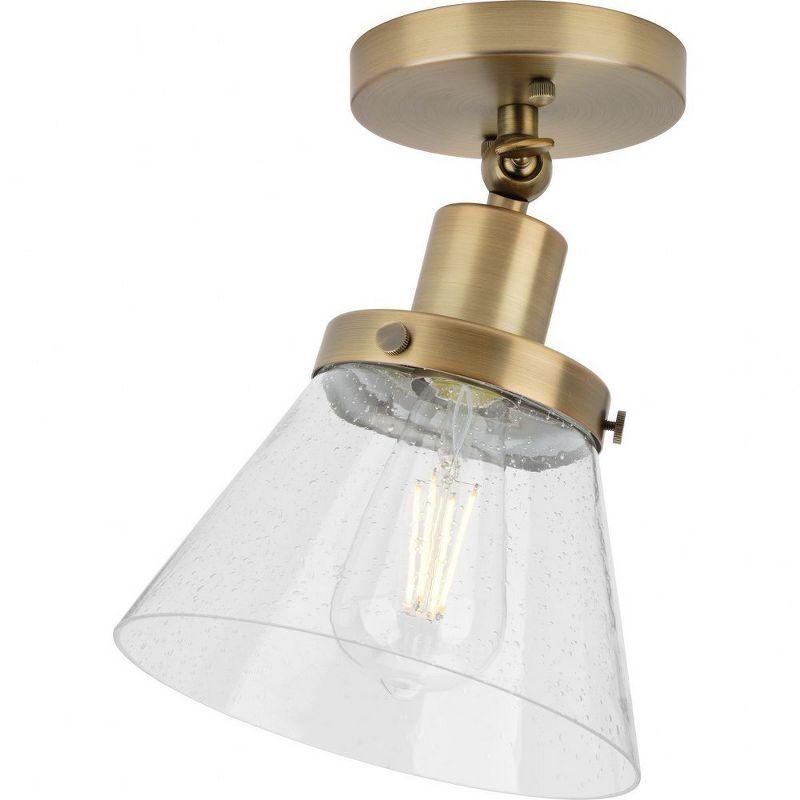 Progress Lighting Hinton 1-Light Industrial Flush Mount Ceiling Light, Vintage Brass, Seeded Glass