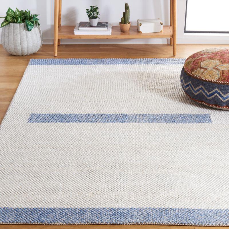 Ivory and Blue Handwoven Wool Area Rug 4' x 6'