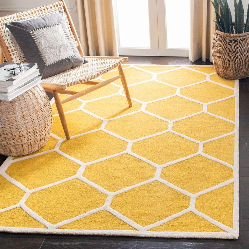 Gold and Ivory Geometric Hand-Tufted Wool Area Rug