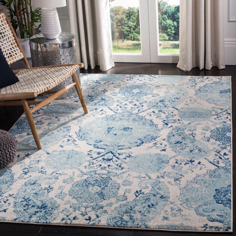 Beige and Turquoise 4' x 6' Synthetic Reversible Area Rug