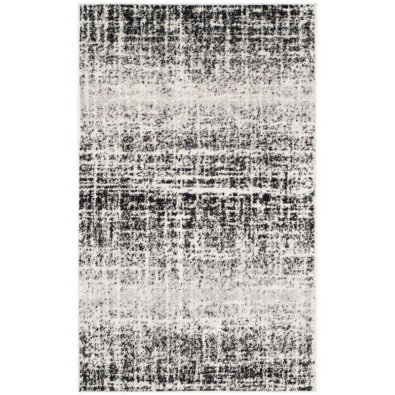 Ivory and Black 3' x 5' Synthetic Abstract Area Rug