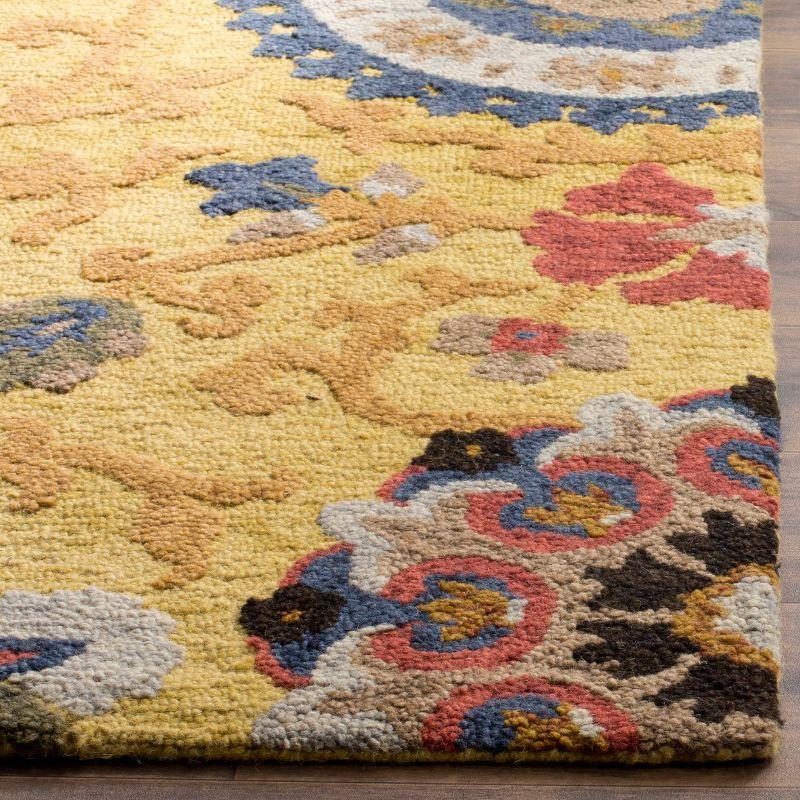 Handmade Blossom Gold and Multicolor Wool 5' x 8' Area Rug