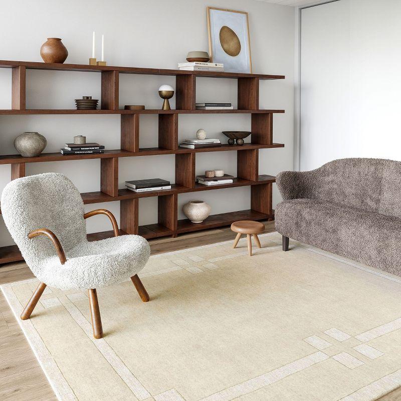 Latitude Run® Rune Bordered Wool-Blend Area Rug