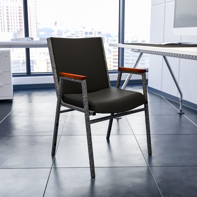 Versatile Black Vinyl and Metal Stack Chair with Armrests