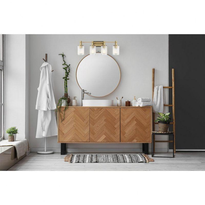 Concord Matte Black and Warm Brass 4-Light Vanity with Ribbed Glass Shades