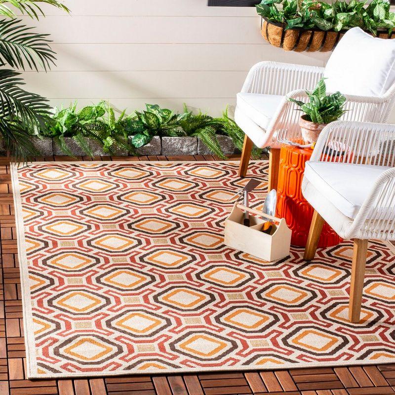 Cream and Red Geometric Floral Synthetic Area Rug