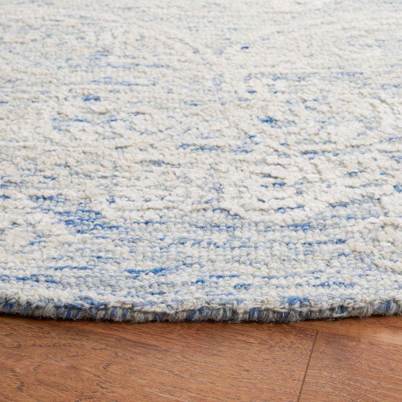 Charlton Home® Batha Hand Tufted Wool/Bamboo Silk/Cotton with Cotton Backing Rug in Blue/Ivory