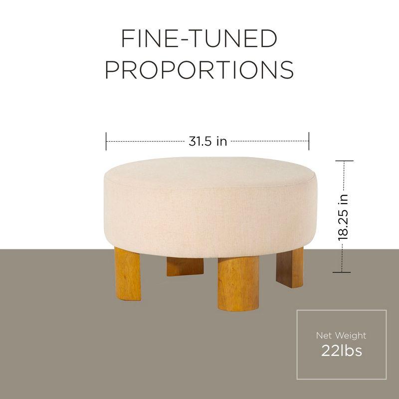 Celia Round Beige Upholstered Ottoman with Natural Wood Legs