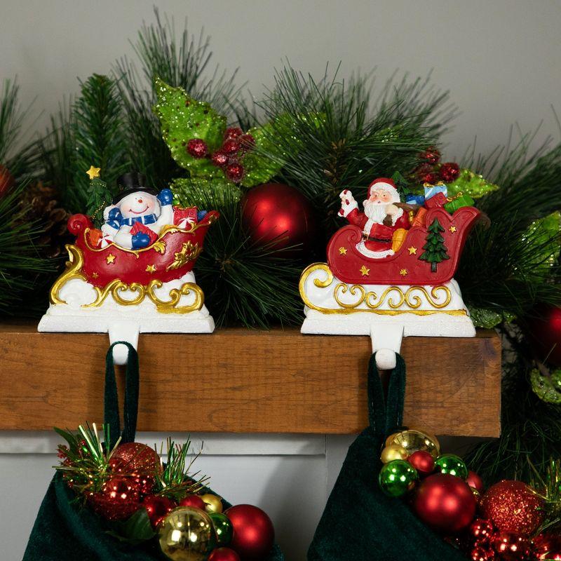 Northlight Santa and Snowman Sleigh Ride Christmas Stocking Holders - 4.25" - Set of 2