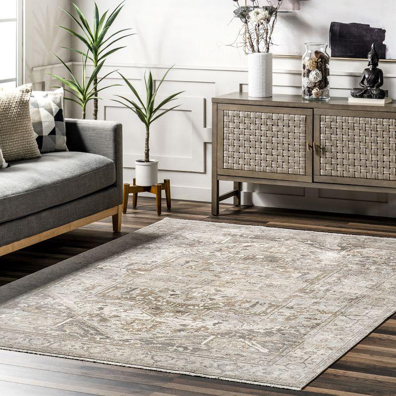 Elegant Silver Medallion 4' x 6' Oval Synthetic Area Rug