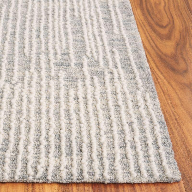 Abstract ABT282 Handmade Tufted Area Rug - Light Grey/Ivory - 6' X 9' - Safavieh