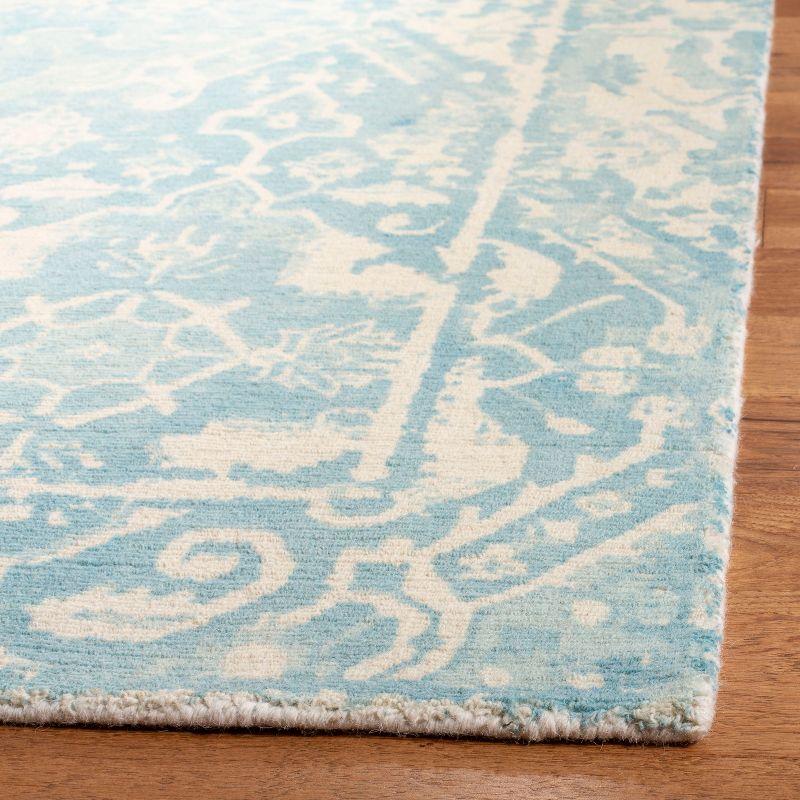 Handmade Light Blue and Ivory Wool Tufted Area Rug