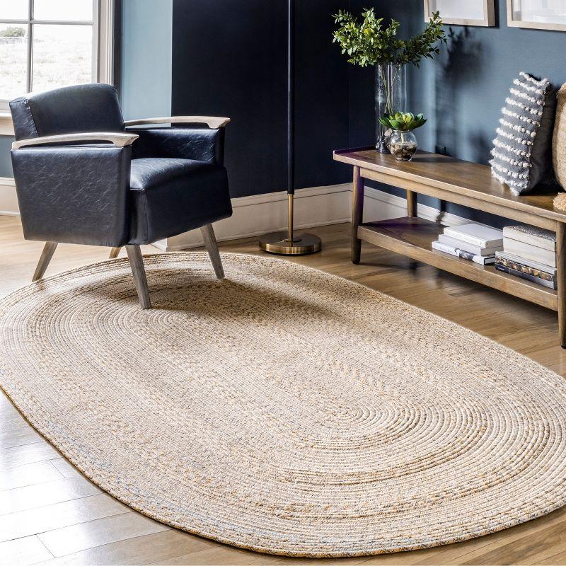 Handmade Ivory Braided 8' x 10' Oval Synthetic Indoor/Outdoor Rug