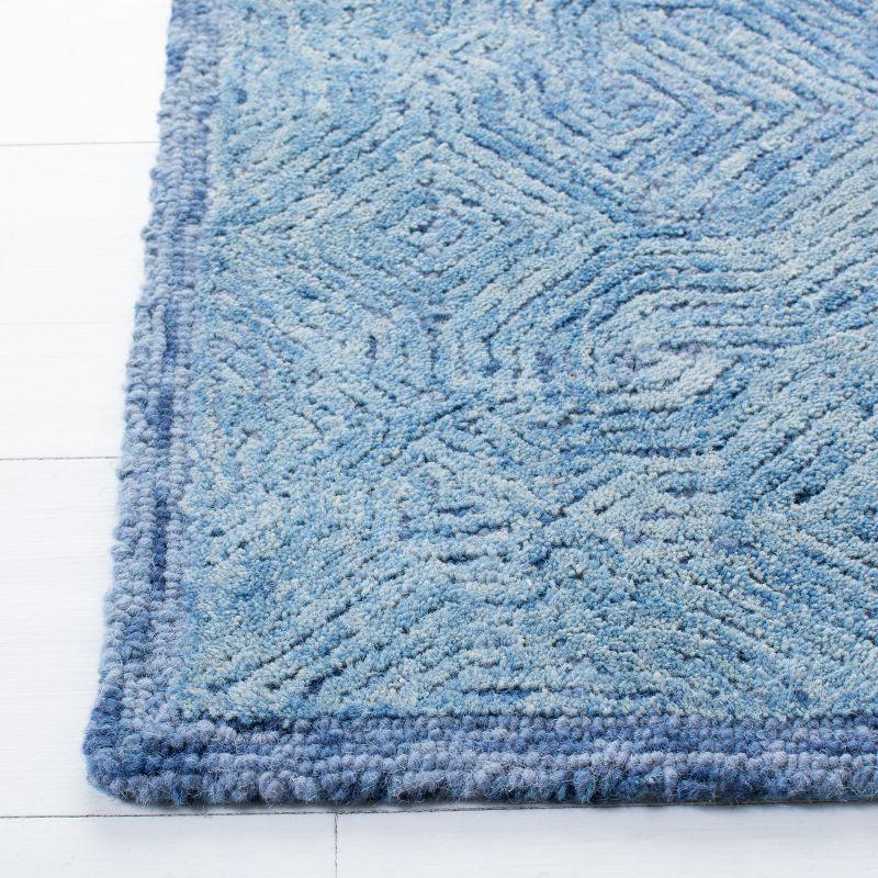 Ikat IKT506 Hand Tufted Area Rug - Blue - 5'x8' - Safavieh