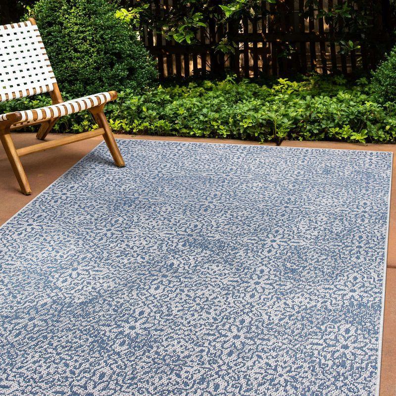 Blue Floral Synthetic Reversible 5' x 7' Area Rug