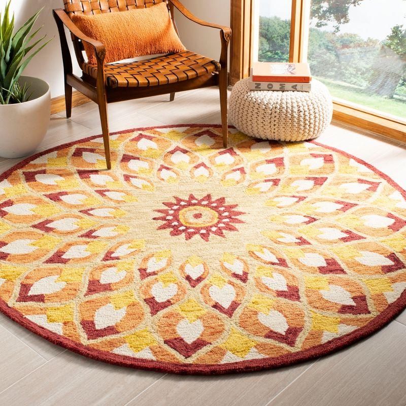 Novelty NOV603 Hand Tufted Area Rug - Rust/Gold - 3' round - Safavieh.