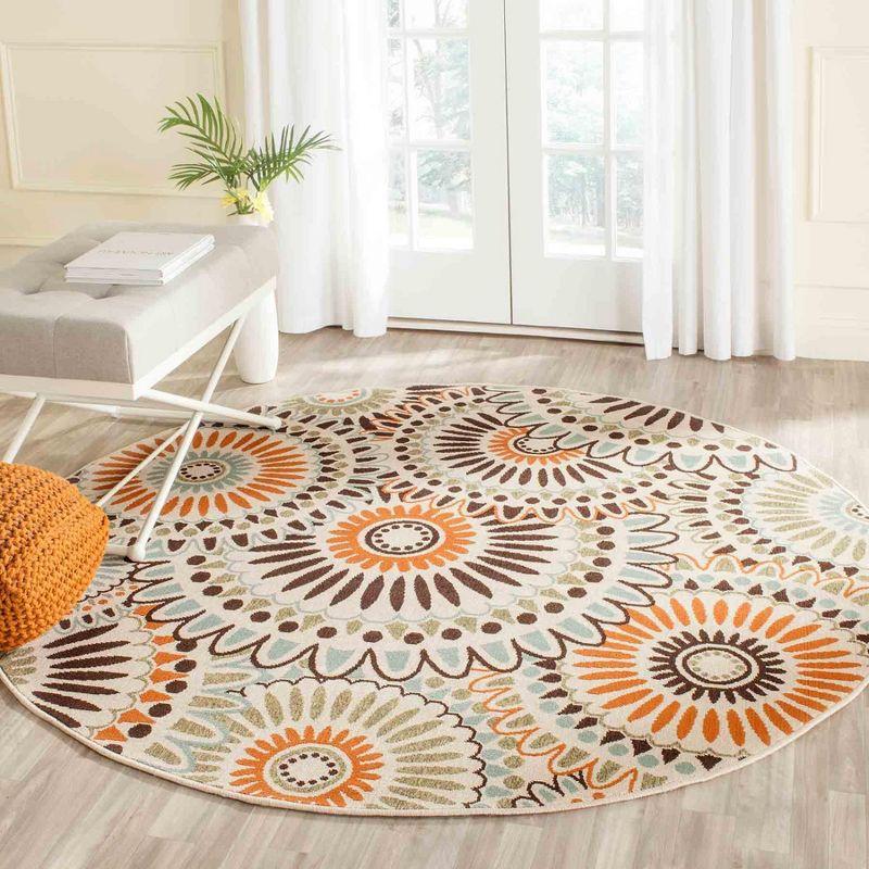 Round Cream and Chocolate Synthetic Floral Area Rug