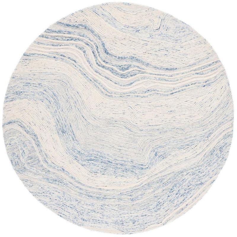 Round Blue and Ivory Tufted Wool Area Rug