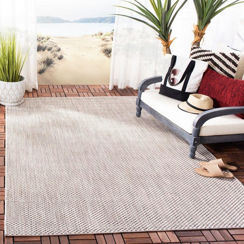 Taupe and Greige Synthetic Outdoor Area Rug