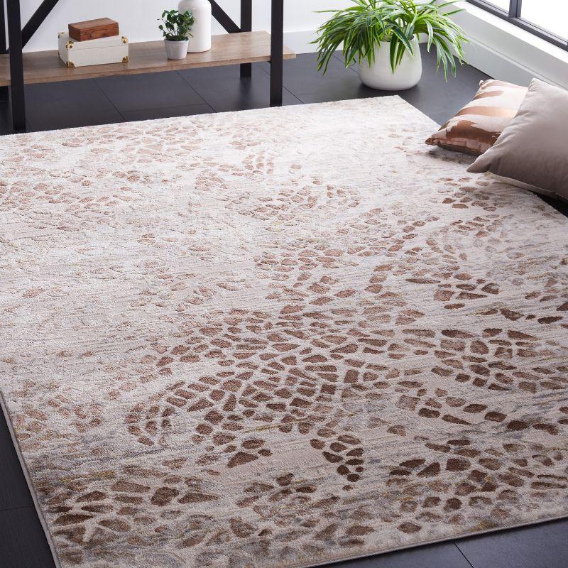 Ivory and Beige Hand-Knotted Synthetic Area Rug