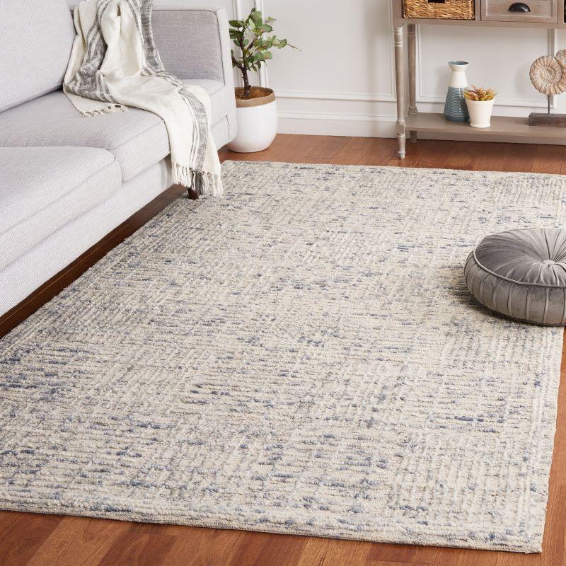 Handmade Light Blue and Ivory Abstract Wool Tufted Rug