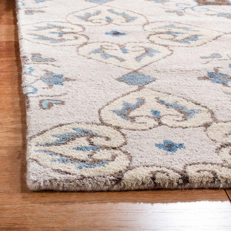 Ivory Elegance 30" Tufted Wool Handmade Non-Slip Area Rug