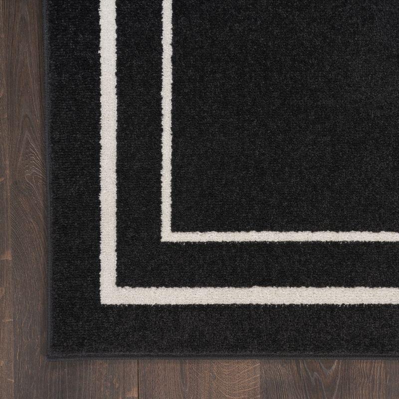 Nourison Essentials 4' x 6' Black Ivory Contemporary Bordered Indoor/Outdoor Area Rug