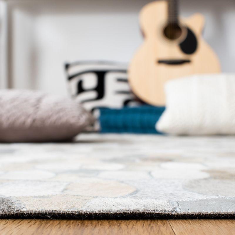 Loon Peak® Belday Flat Weave Hair On Leather Rug