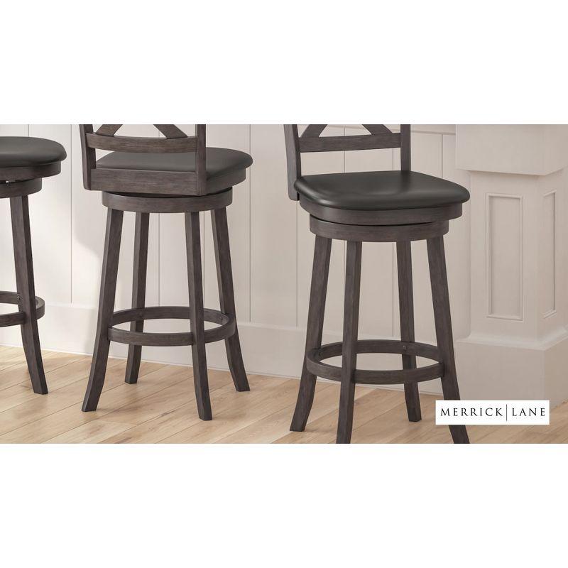 Merrick Lane 30" Gray Wash Walnut Classic Wooden Crossback Swivel Bar Height Pub Stool with Black Faux Leather Padded Seat and Integrated Footrest