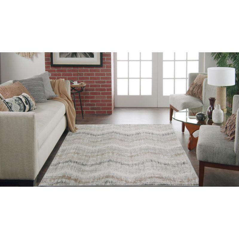 Ivory Multicolor 4' x 6' Abstract Synthetic Area Rug