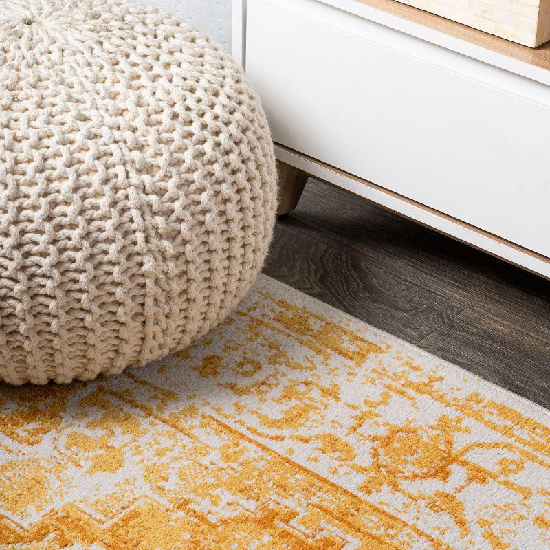 Ivory and Orange Bohemian Medallion 4'x6' Synthetic Area Rug