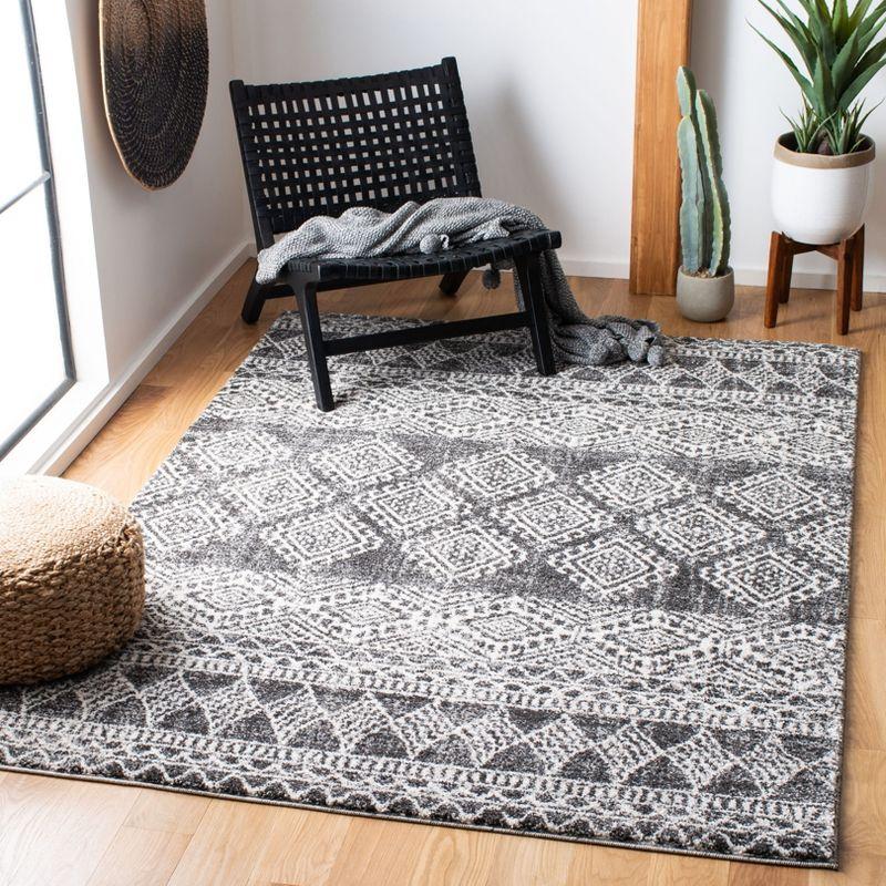 Berber-Inspired Black and Ivory Geometric Synthetic Area Rug