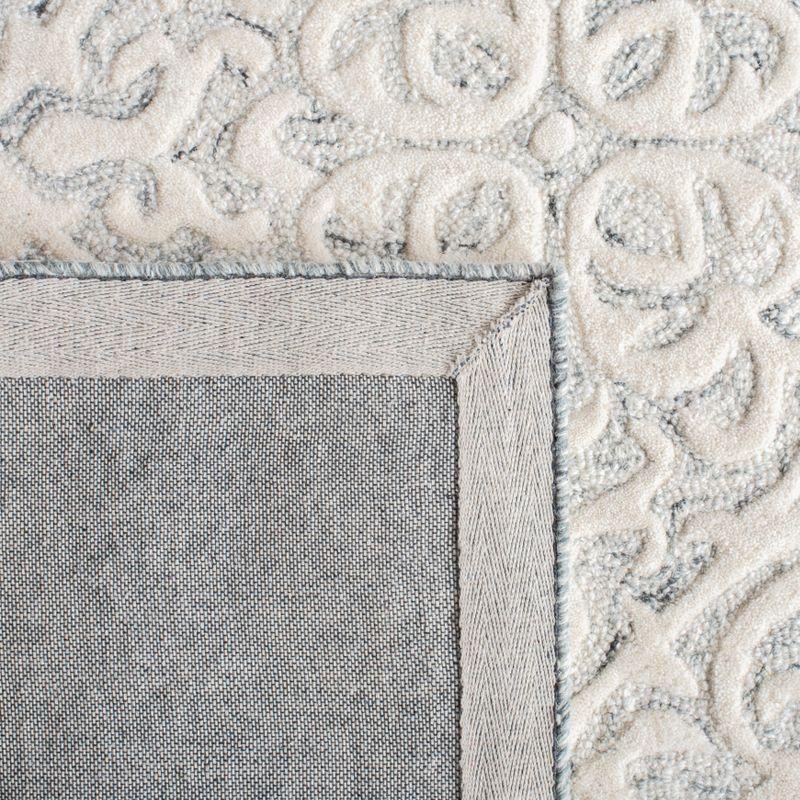 Metro MET857 Hand Tufted Indoor Area Rug - Silver/Ivory - 5'x8' - Safavieh