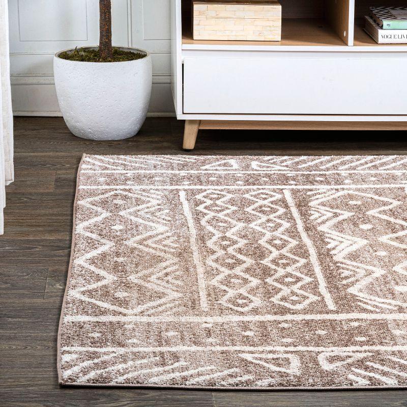 Ivory and Brown Geometric Synthetic 4' x 6' Reversible Area Rug