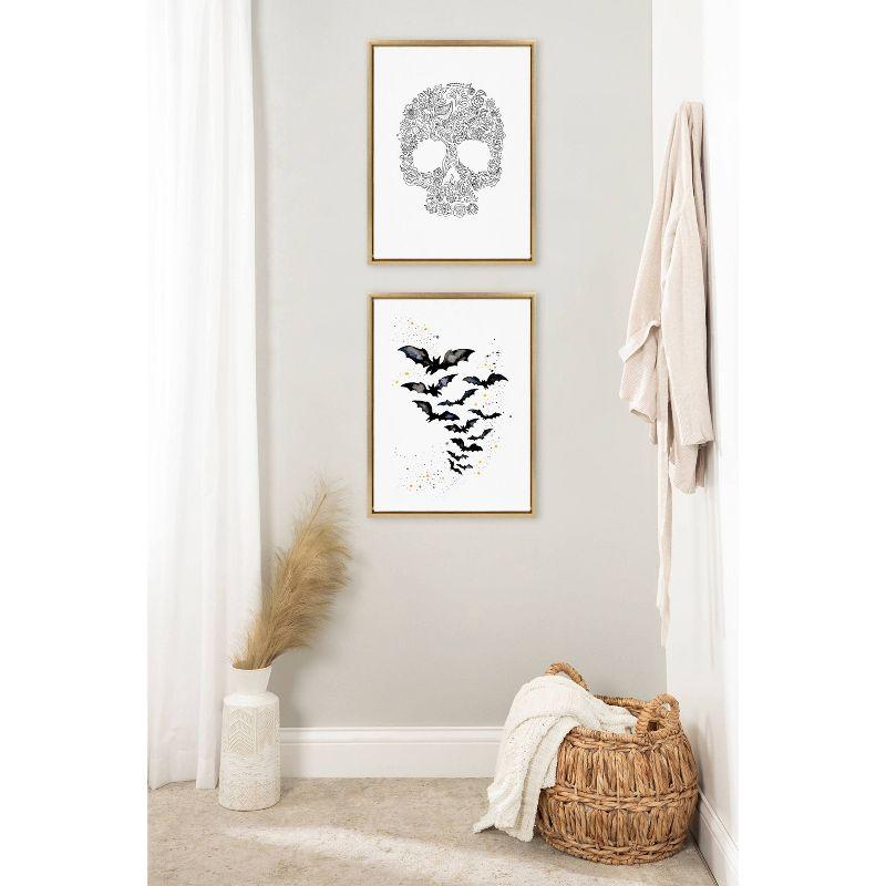 Kate & Laurel All Things Decor 18"x24" Sylvie Skull Print Framed Canvas Wall Art by Viola Kreczmer Gold Black and White Floral