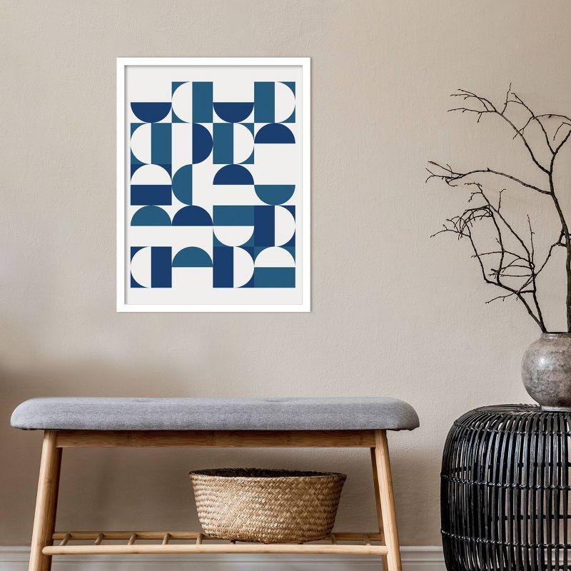 Blue and White Geometric Abstract Print in Maple Frame