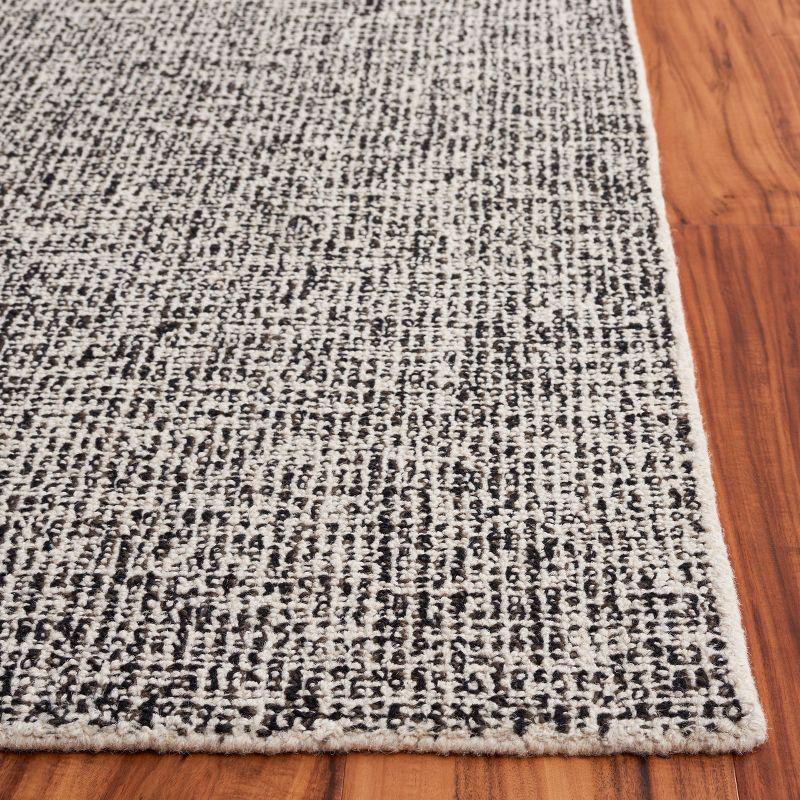 Handmade Black Wool Tufted 4' x 6' Area Rug