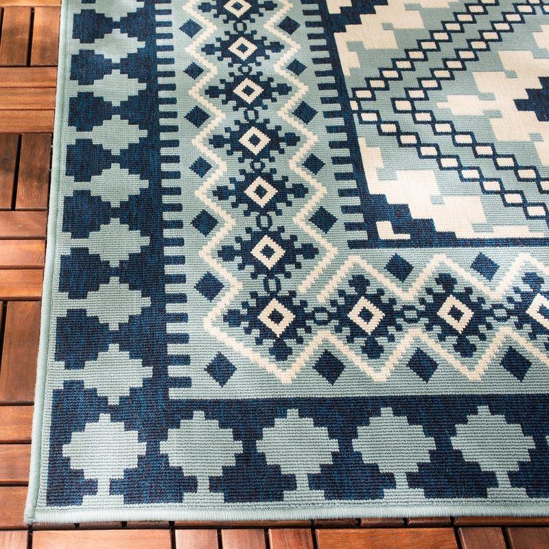 Veranda VER099 Power Loomed Indoor/Outdoor Area Rug - Ivory/Blue - 6'7"x9'6" - Safavieh.
