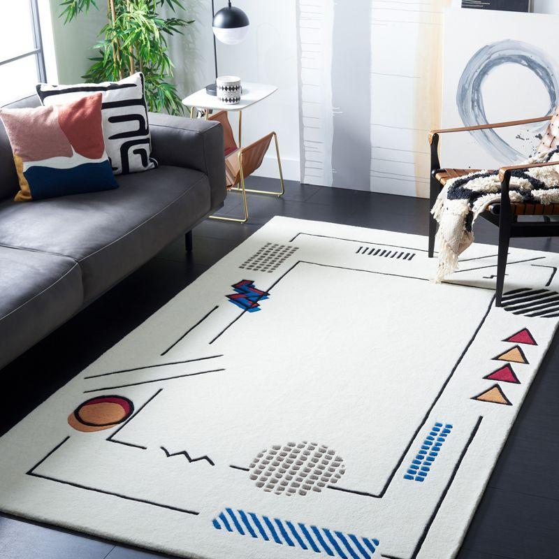 Fifth Avenue FTV125 Hand Tufted Area Rug - Ivory/Blue - 5'x8' - Safavieh.