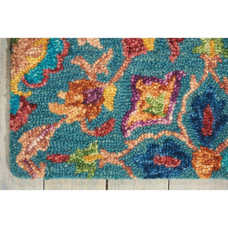 Handmade Teal Floral Wool Area Rug 5' x 7'