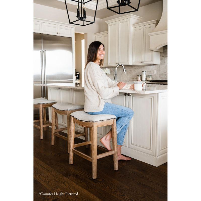 Maven Lane Maven Lane Adrien Saddle Bar Stool In Aged Black Finish 31" With Snow White Fabric Upholstery