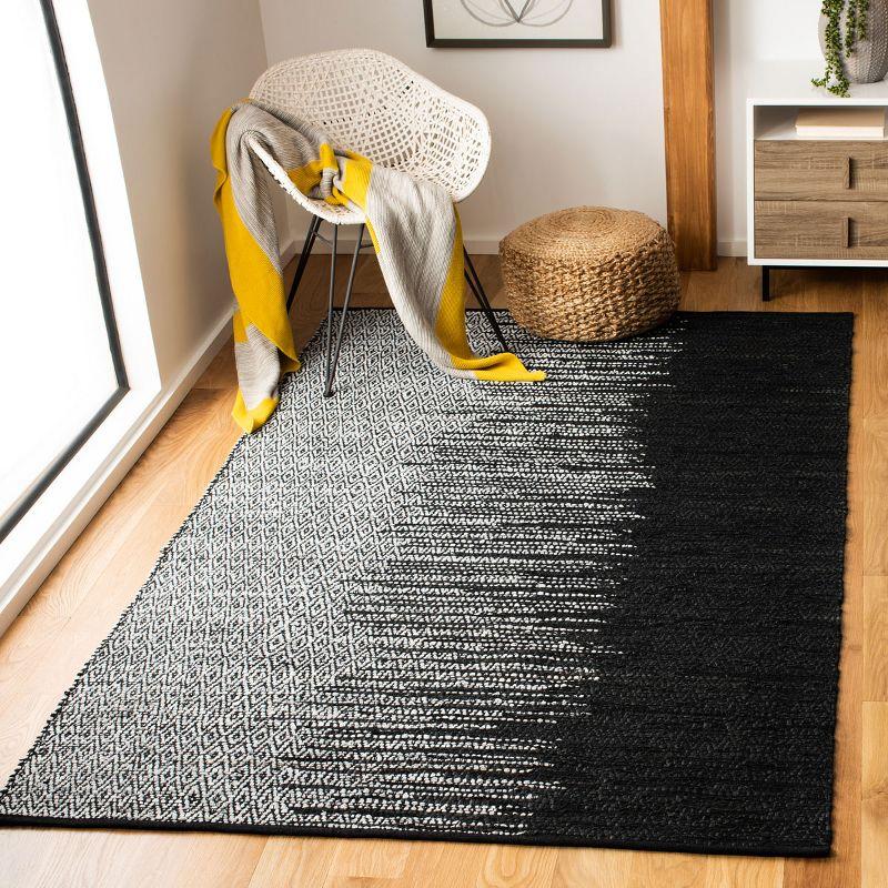 Handmade Round Black Cowhide 60" Area Rug