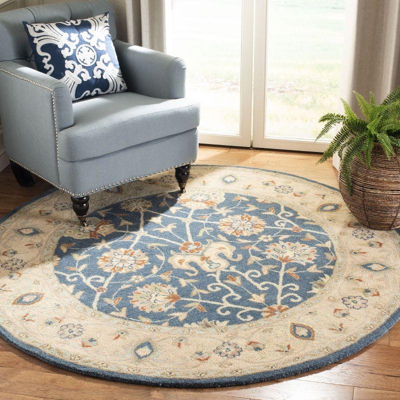 Antiquity AT21 Hand Tufted Indoor Area Rug - Blue - 4'6"x6'6" Oval - Safavieh