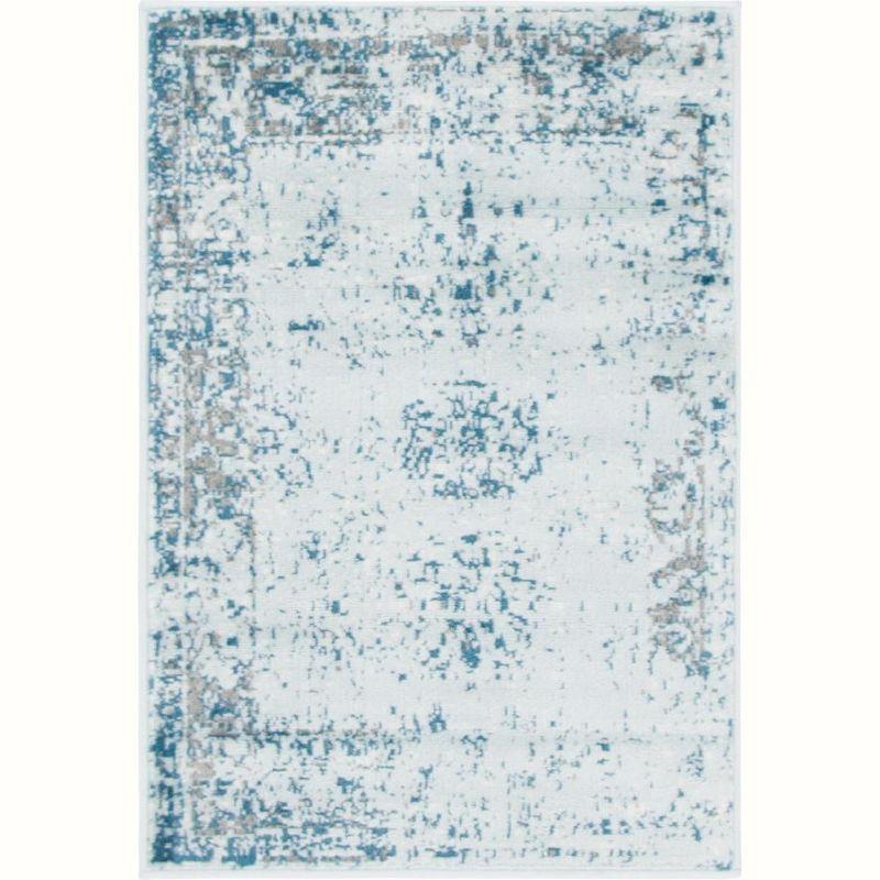 Reversible Handmade Light Blue Synthetic Indoor Rug