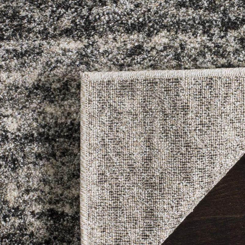 Ivory and Grey Abstract Synthetic Area Rug