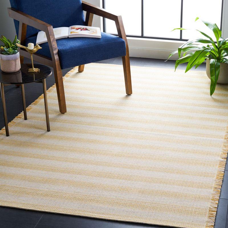 Ivory Gold Nomadic Stripe 8' x 10' Synthetic Area Rug