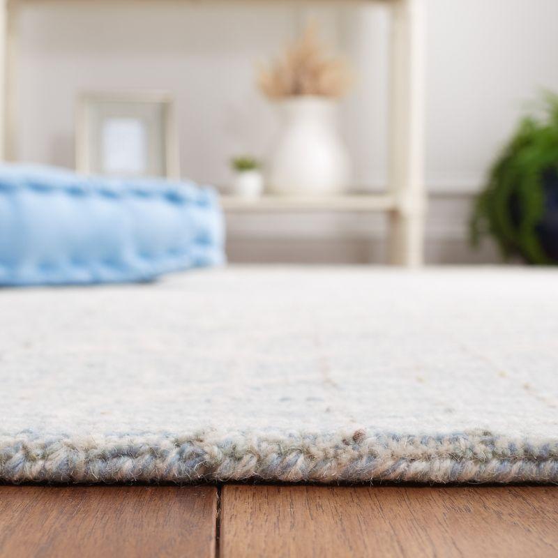 Metro MET881 Hand Tufted Indoor Accent Rug - Blue/Ivory - 3'x5' - Safavieh