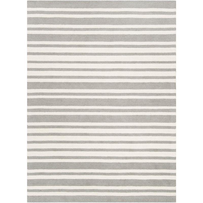 Safavieh Kids SFK917 Hand Tufted Area Rug  - Safavieh