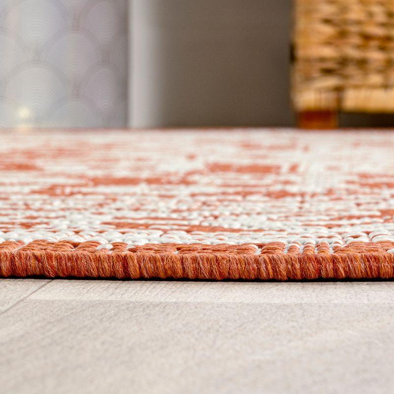 9' x 12' Sinjuri Medallion Textured Weave Indoor/Outdoor Area Rug, Orange/Cream - JONATHAN Y